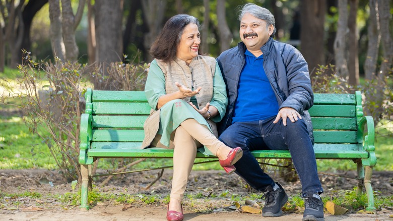 Older couple sitting on bench