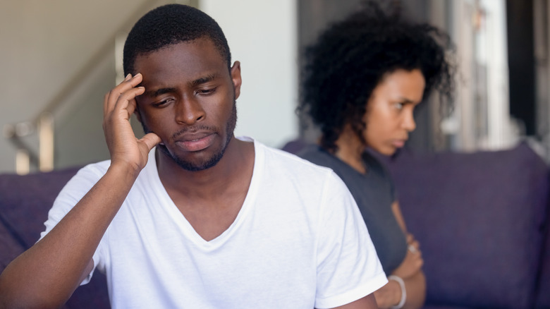 Couple arguing with negative body language