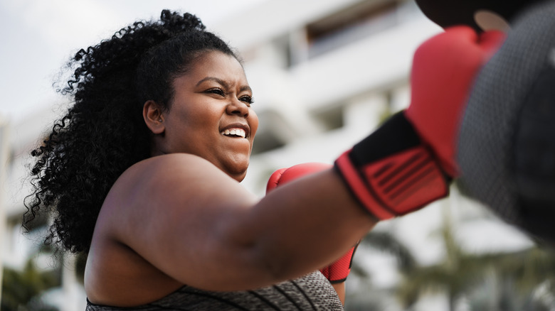 Black woman boxing