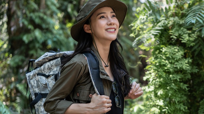 Smiling woman on nature hike