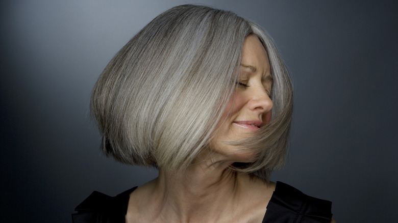 Woman with gray hair smiling