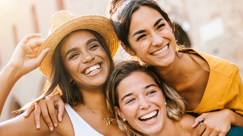 Group of smiling women