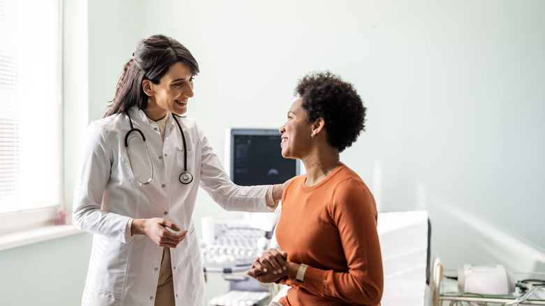 patient talking to doctor