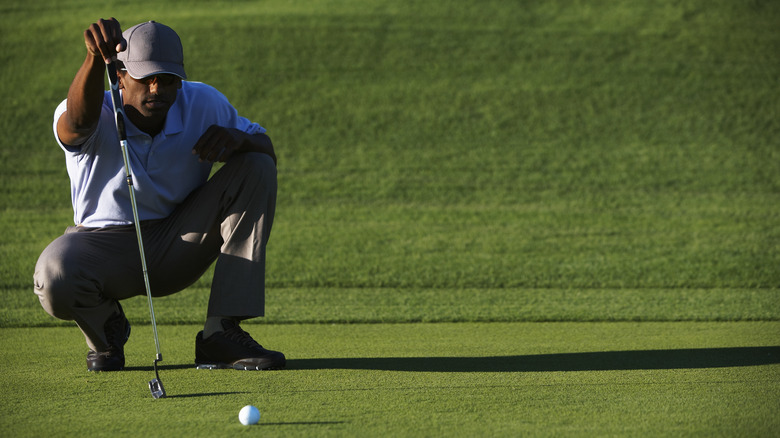 man golfing