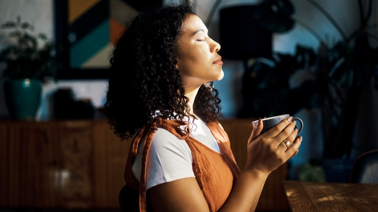 Woman practicing self-care