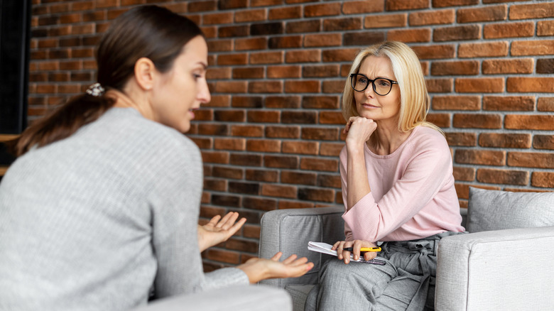 Woman speaking to therapist