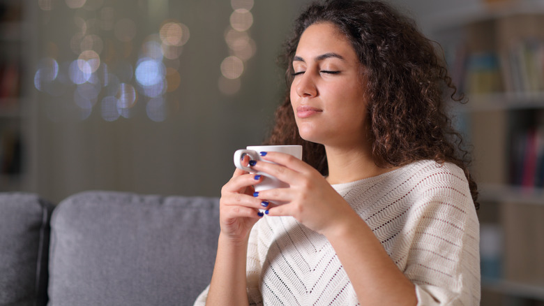 woman relaxing with mug