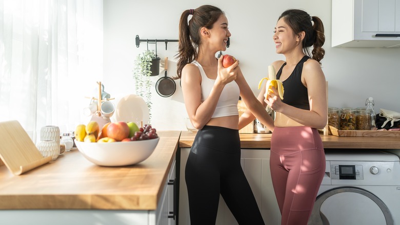 Women eating fruit