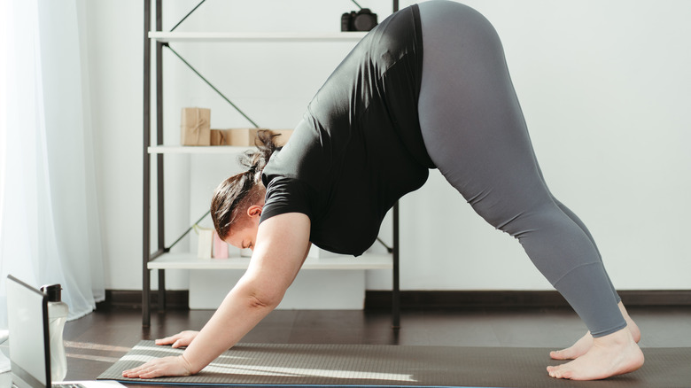 Woman downward dog 