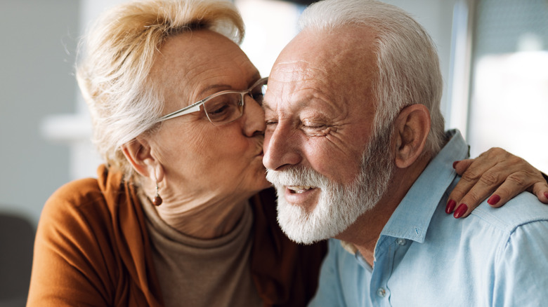 older couple kissing