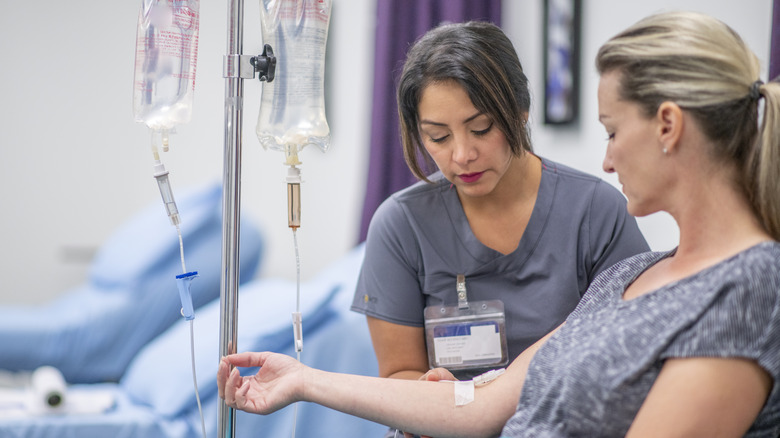 Woman receiving chemotherapy treatment