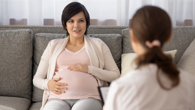 Woman talks with her doctor 