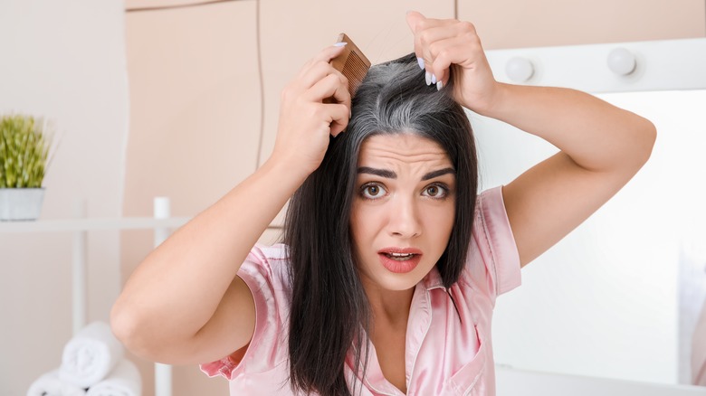 woman combing hair