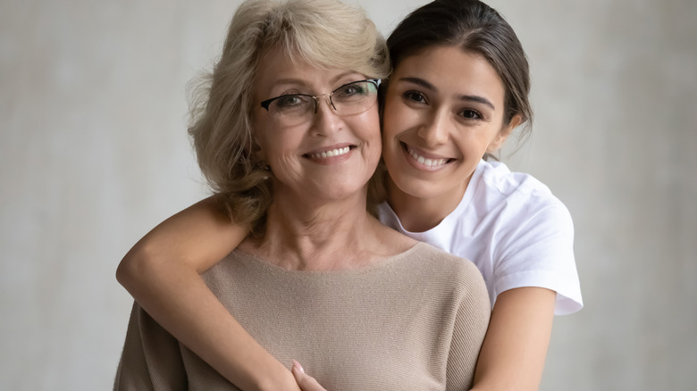 mother and daughter hugging