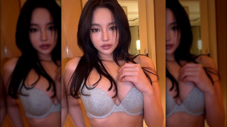 Asian woman wearing gray bra