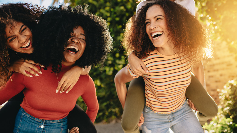 group of women laughing together