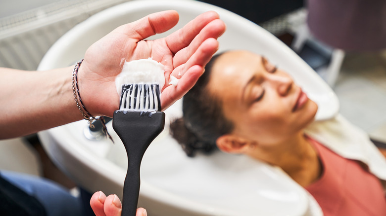 stylist preparing to color hair