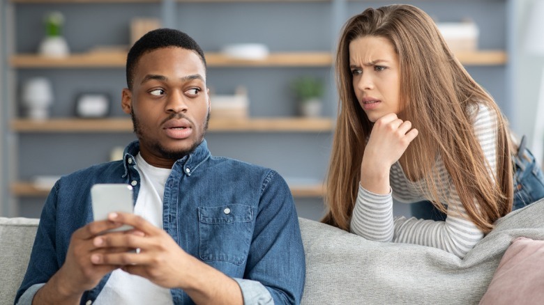 Woman suspicious of boyfriend texting