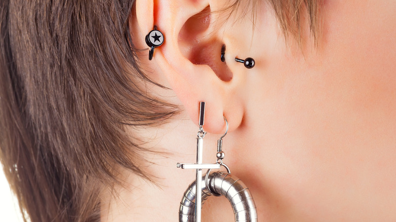 earrings on cartilage and earlobe