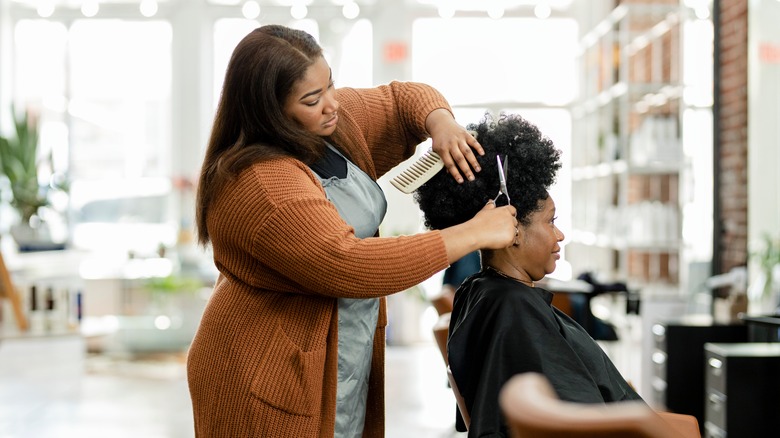 stylist cutting hair