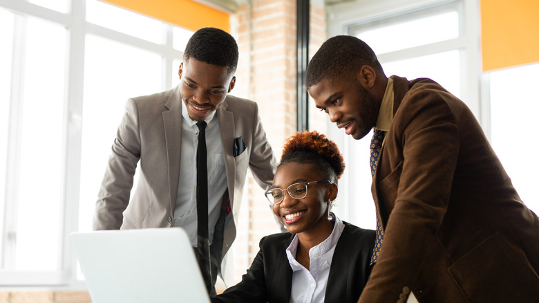 Three African American business workers