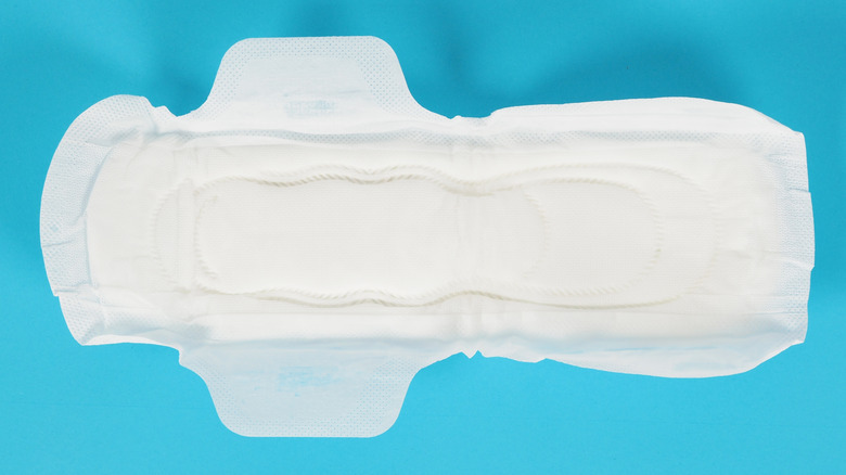 sanitary pad on blue background