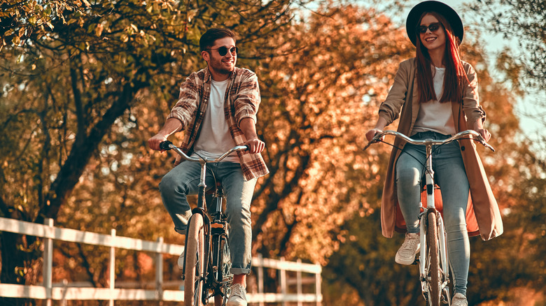 man and woman on bicycles