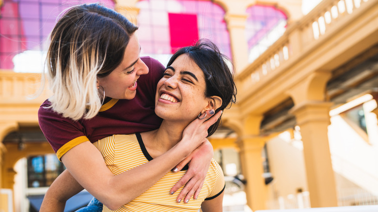 two women smiling