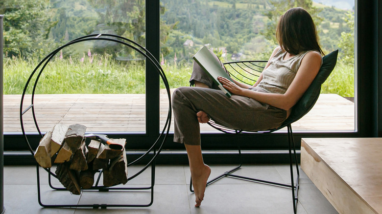 Woman relaxes with a book
