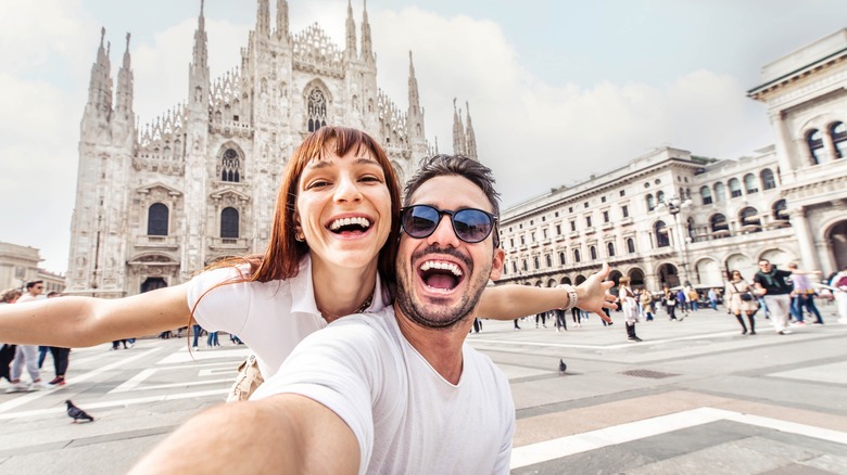 couple taking selfie on vacation