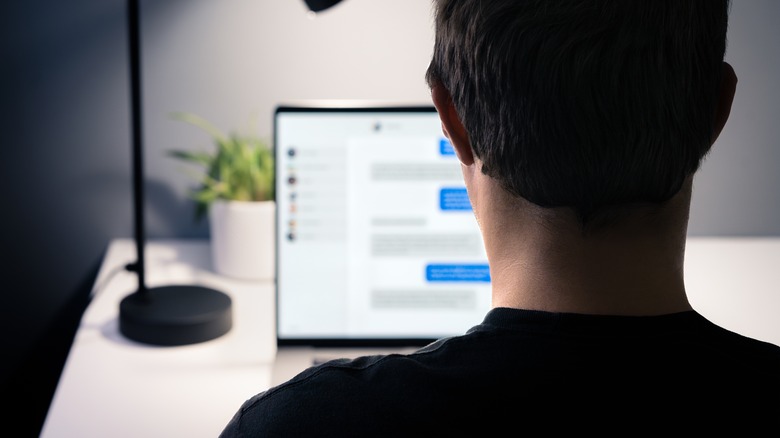 person using laptop to chat online