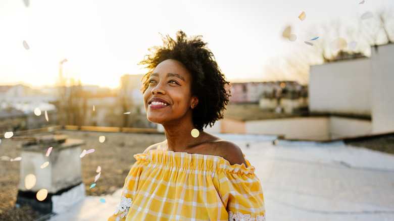 woman outside smiling