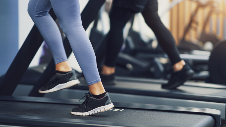 People working out on treadmill