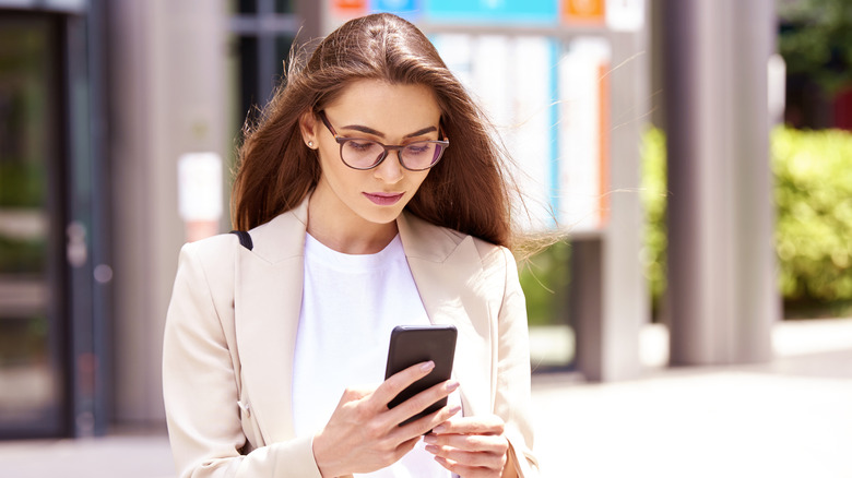 Woman checking her text messages 