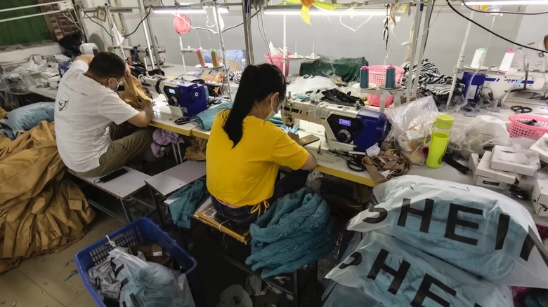 Factory workers in China sewing clothing for Shein