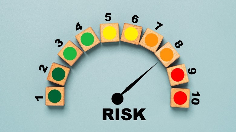 Risk scale made of blocks