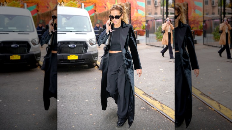 Rita Ora wearing black velvet coat