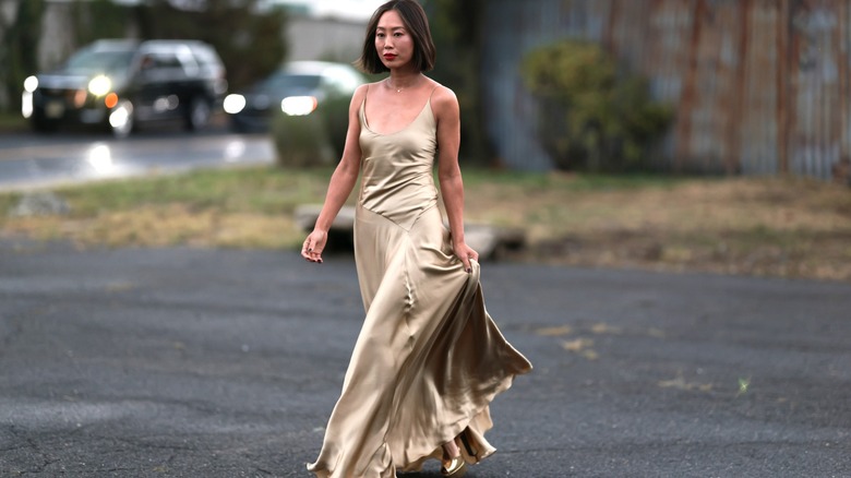 Aimee Song wearing champagne gown