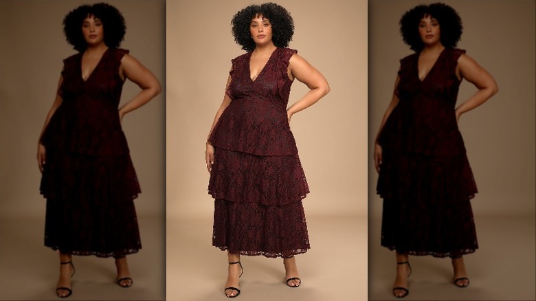 woman wearing burgundy lace dress 