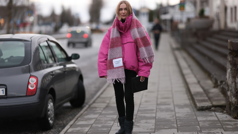 Woman in oversized pink jacket 