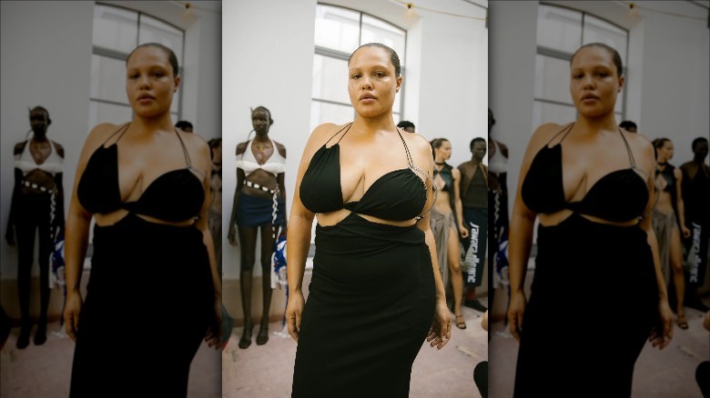 Karoline Vitto model wears cut-out black dress