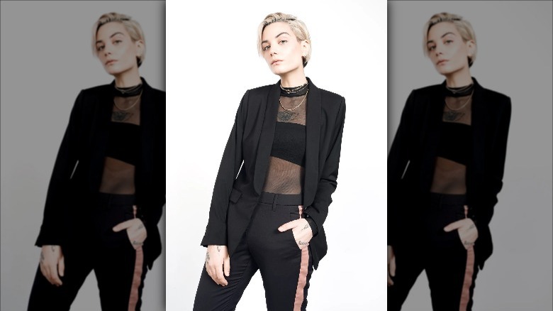 Wildfang model wears black empower tux