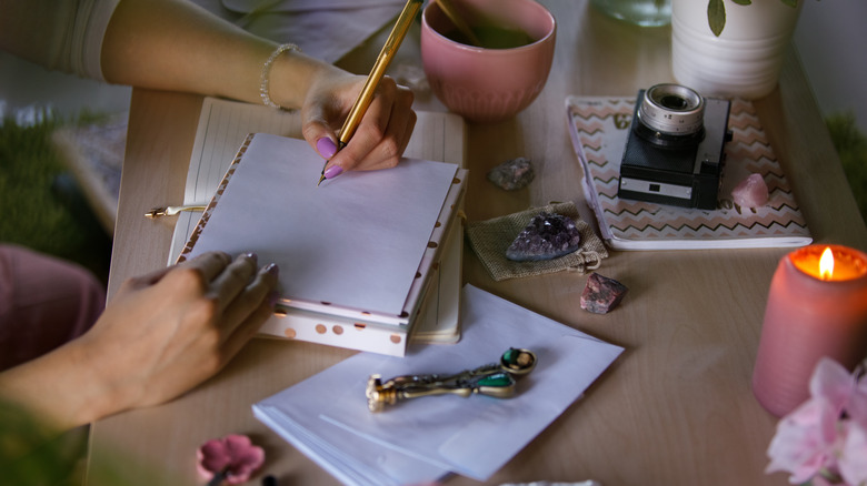 Woman writing in card