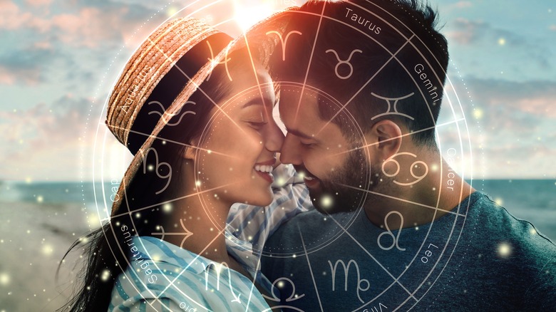 Astrological chart over kissing couple