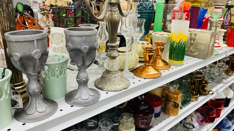 Assorted merchandise on thrift store shelves