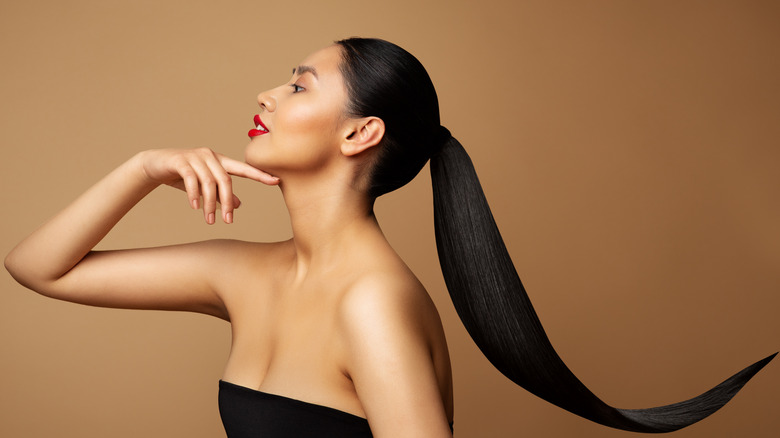 woman with long hair in ponytail