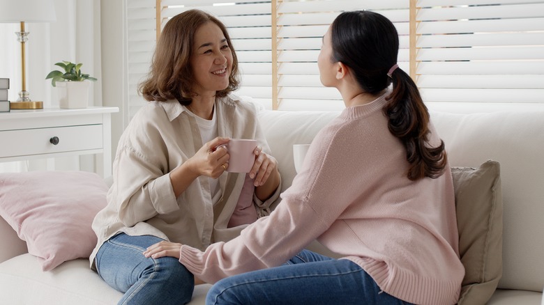 Mother and daughter chatting