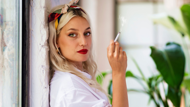 woman smoking cigarette