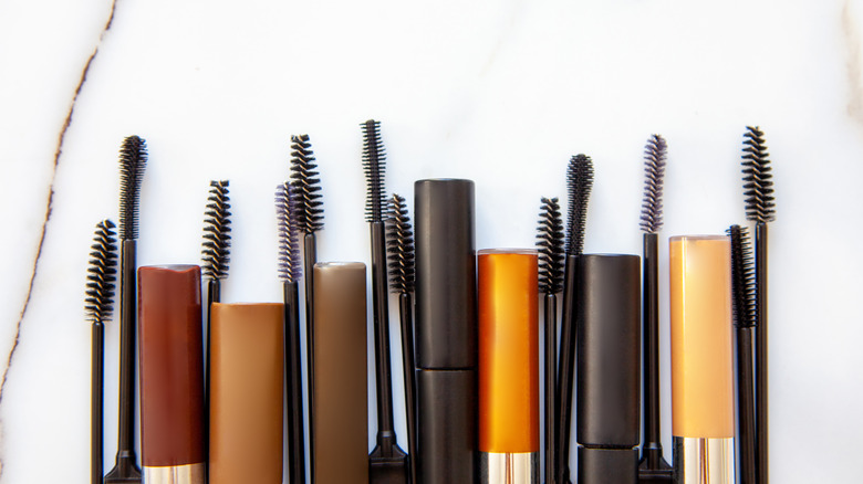 row of mascara bottles