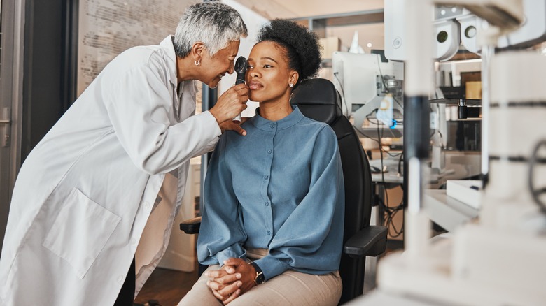 Woman having her eyes tested